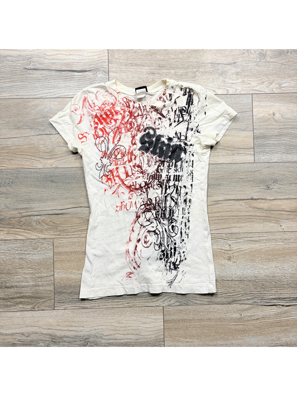 Woman’s Y2K skin skateboard top, stains throughout, size XS
